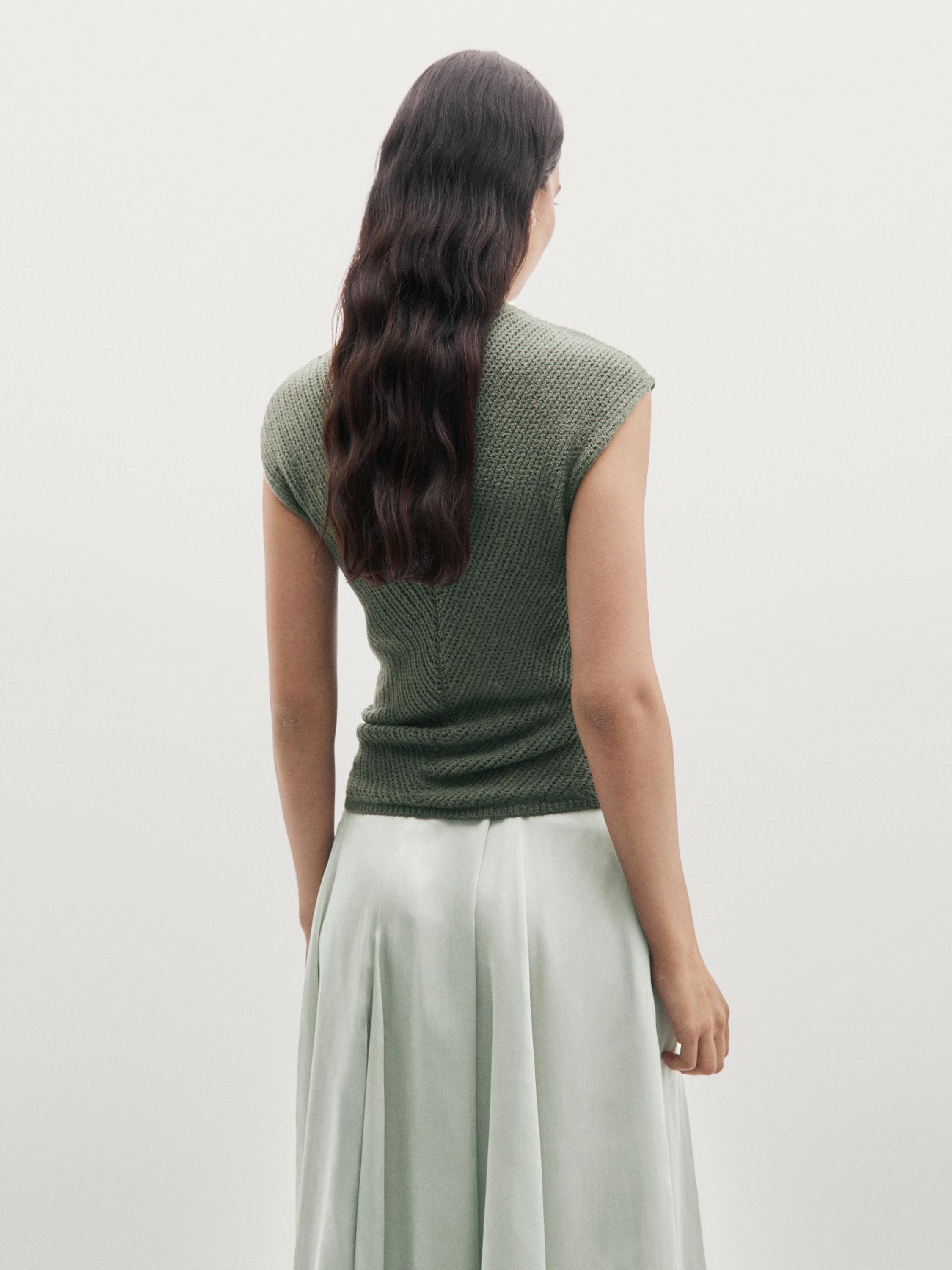 Top en maille sans manches à ajours fantaisie